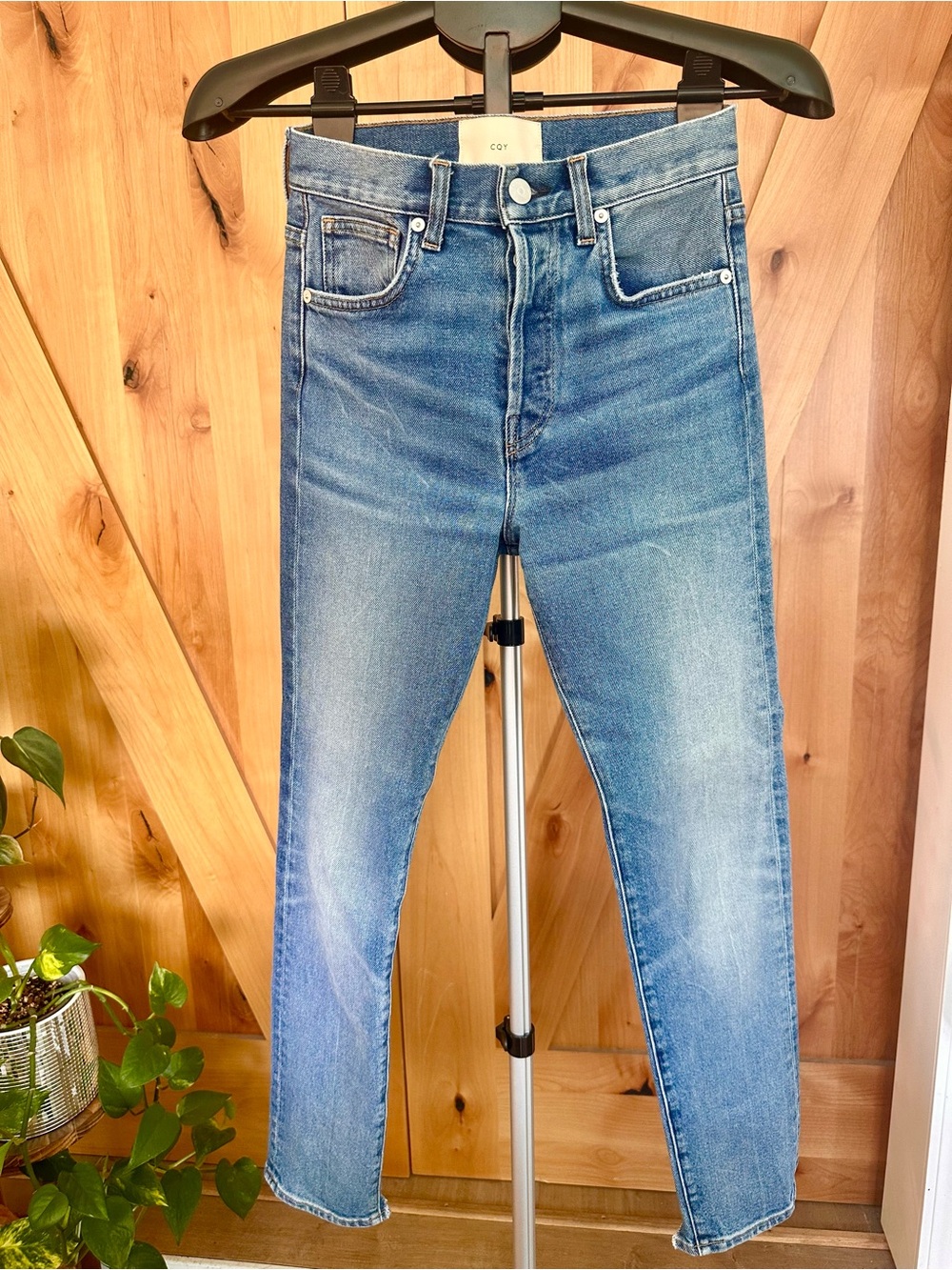 CQY Denim high-rise straight-leg jeans in a medium-to-light blue wash